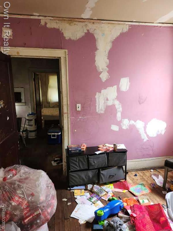 1950 Lawrence St, Detroit, MI 48206 - bedroom with hardwood / wood-style flooring