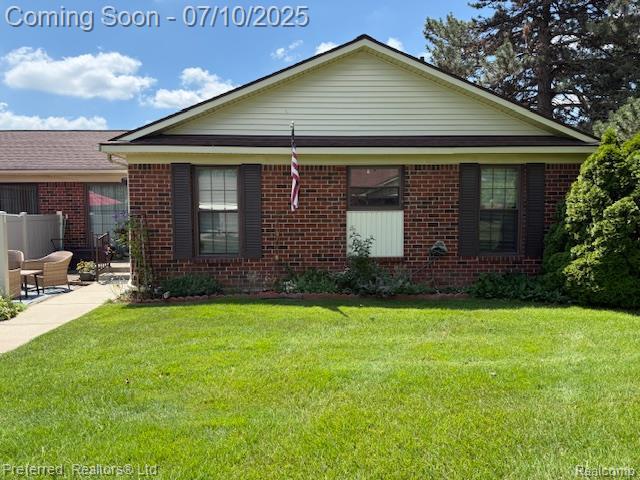 40219 Newport Dr, Plymouth, MI 48170 - ranch-style house featuring brick siding and a patio