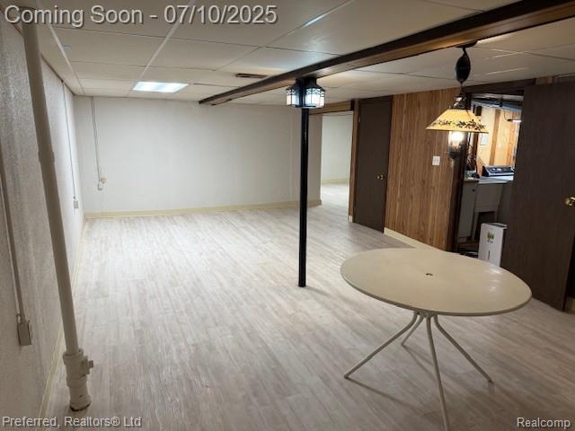 40219 Newport Dr, Plymouth, MI 48170 - finished basement featuring wood finished floors and a paneled ceiling