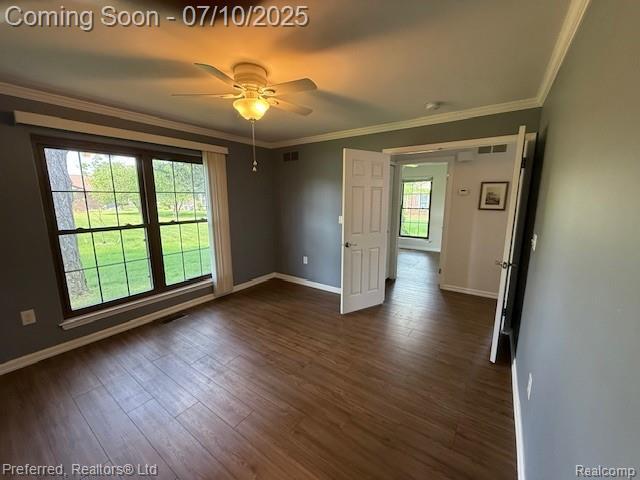 40219 Newport Dr, Plymouth, MI 48170 - empty room with dark wood-style flooring, ornamental molding, and ceiling fan