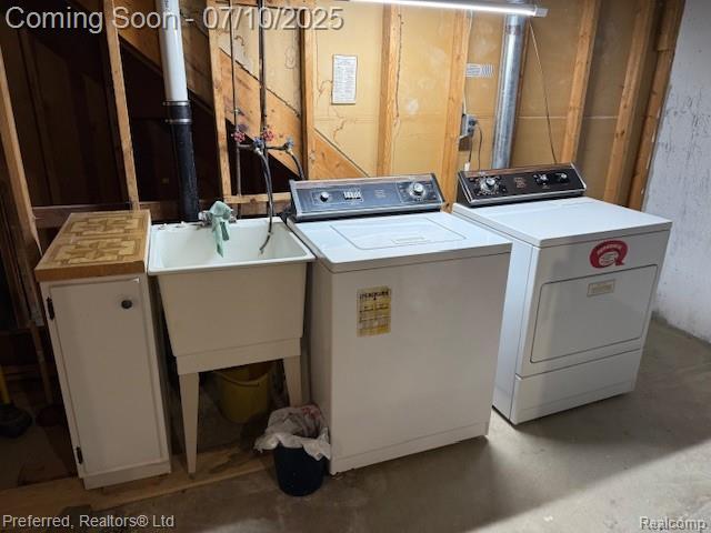 40219 Newport Dr, Plymouth, MI 48170 - laundry room featuring separate washer and dryer