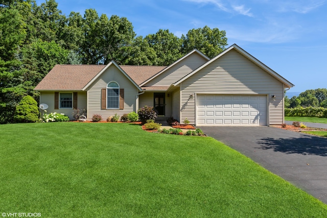 4175 Schmuhl Rd, Coloma, MI 49038 - ranch-style house featuring driveway, an attached garage, a front yard, and a shingled roof