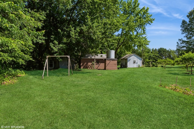 4175 Schmuhl Rd, Coloma, MI 49038 - view of grassy yard with an outdoor structure