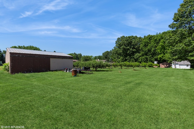 4175 Schmuhl Rd, Coloma, MI 49038 - view of grassy yard with an outdoor structure and a pole building