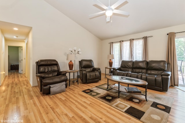 4175 Schmuhl Rd, Coloma, MI 49038 - living area featuring light wood finished floors, a ceiling fan, and high vaulted ceiling