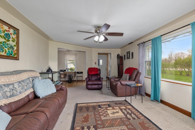3116 E Apple Ave, Muskegon, MI 49442 - living room featuring carpet floors and a ceiling fan