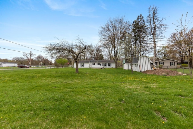 3116 E Apple Ave, Muskegon, MI 49442 - view of yard featuring a storage shed