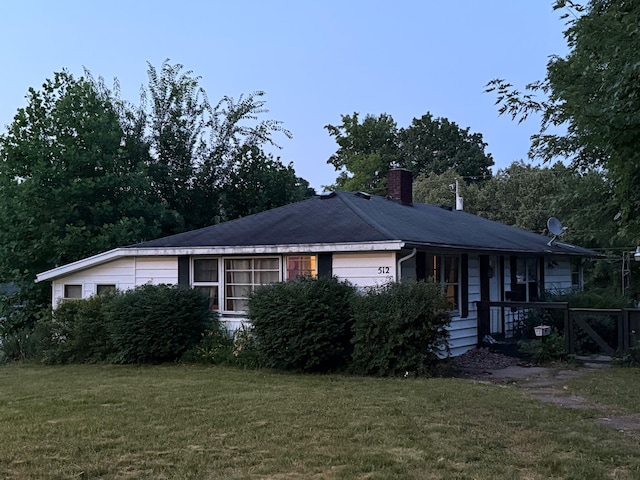 512 Green St, Dowagiac, MI 49047 - view of front of home with a chimney and a front yard