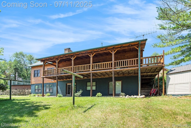 16501 Winters Rd, Grass Lake, MI 49240 - rear view of property featuring a chimney, a deck, and a lawn