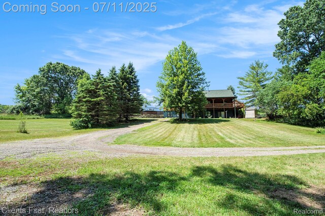 16501 Winters Rd, Grass Lake, MI 49240 - view of green lawn featuring driveway