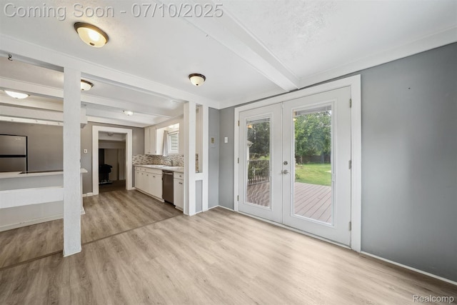 4309 Marr Ave, Warren, MI 48091 - unfurnished living room featuring french doors, beam ceiling, and light wood-type flooring