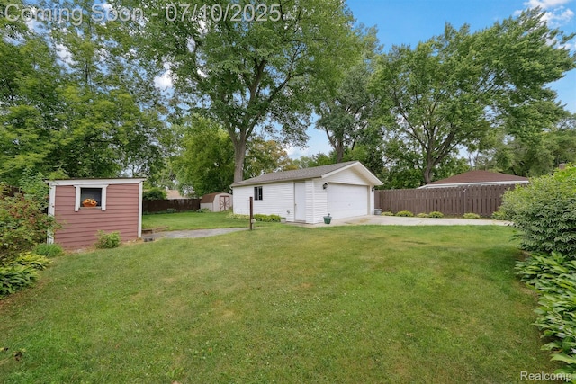 4309 Marr Ave, Warren, MI 48091 - view of yard featuring a shed and a garage