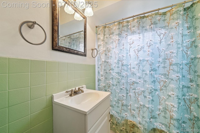 4309 Marr Ave, Warren, MI 48091 - full bath featuring tile walls, vanity, a shower with curtain, and wainscoting