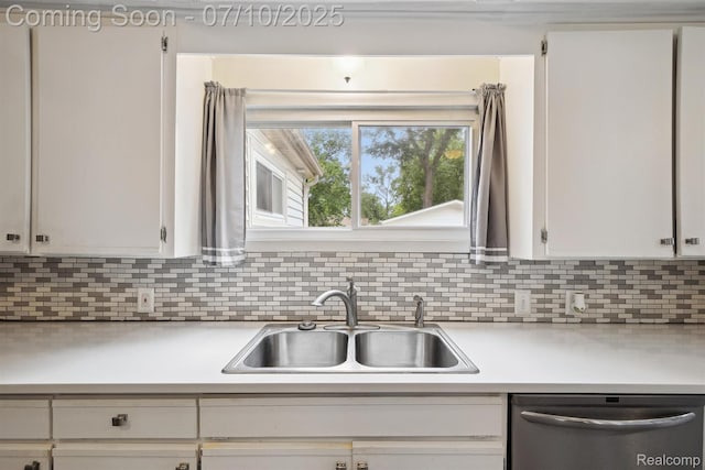 4309 Marr Ave, Warren, MI 48091 - kitchen featuring dishwasher, light countertops, backsplash, and white cabinets