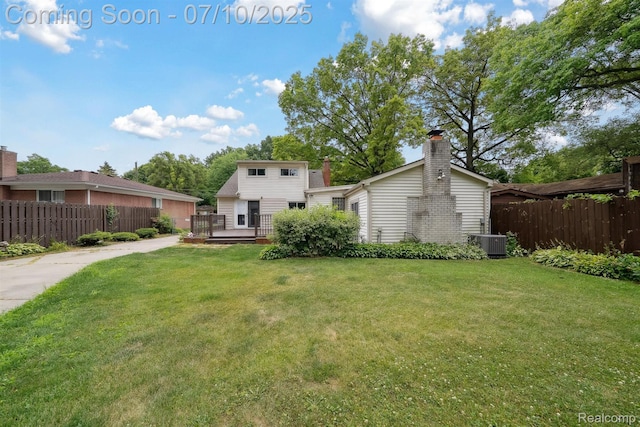 4309 Marr Ave, Warren, MI 48091 - rear view of property featuring a deck and a chimney
