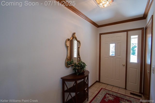 48600 Meadowcrest Dr, Macomb, MI 48044 - foyer featuring light tile patterned floors and ornamental molding