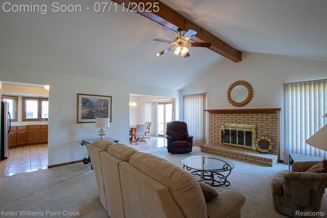 48600 Meadowcrest Dr, Macomb, MI 48044 - living room with light colored carpet, a ceiling fan, and a fireplace