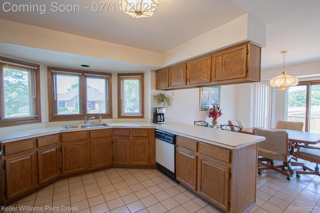 48600 Meadowcrest Dr, Macomb, MI 48044 - kitchen featuring dishwasher, a chandelier, a peninsula, light countertops, and light tile patterned floors