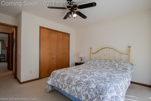 48600 Meadowcrest Dr, Macomb, MI 48044 - bedroom with light carpet, a closet, and a ceiling fan