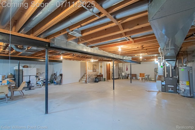 48600 Meadowcrest Dr, Macomb, MI 48044 - unfinished below grade area with gas water heater, stairs, and heating unit