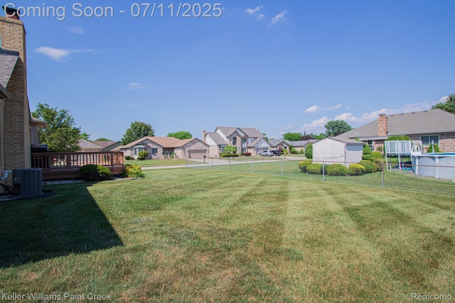 48600 Meadowcrest Dr, Macomb, MI 48044 - fenced backyard featuring a residential view and a deck
