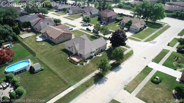 48600 Meadowcrest Dr, Macomb, MI 48044 - aerial perspective of suburban area with a pool