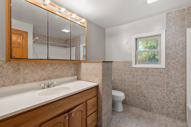 1402 Gracel St, Jackson, MI 49202 - bathroom with tile walls, vanity, a shower, tile patterned floors, and a bathtub
