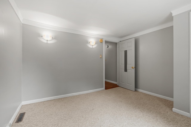1402 Gracel St, Jackson, MI 49202 - empty room with crown molding and carpet floors