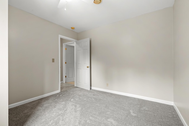 1402 Gracel St, Jackson, MI 49202 - empty room featuring carpet flooring and a ceiling fan