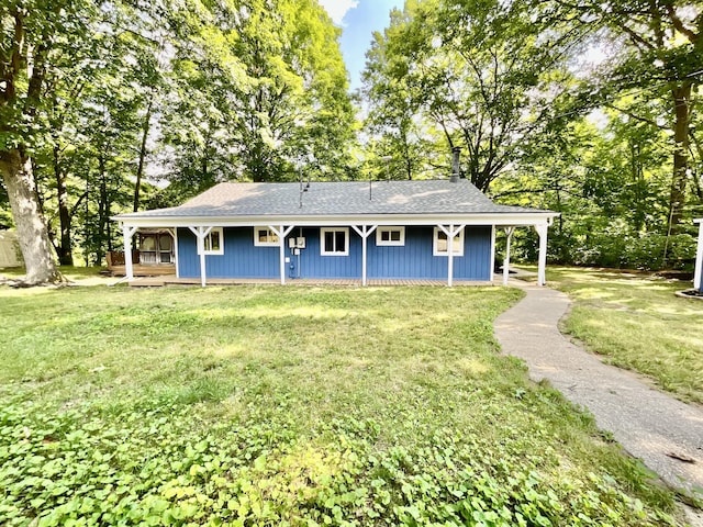 18572 Oxbow Dr, Barryton, MI 49305 - view of front of property featuring a front yard, a porch, and a shingled roof