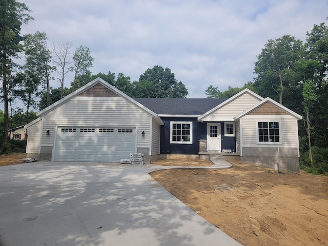 36 S Yankee Springs Rd, Middleville, MI 49333 - ranch-style home with driveway and an attached garage
