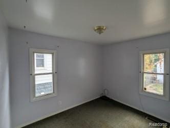 61 W End Ave, Waterford, MI 48328 - unfurnished room featuring dark colored carpet