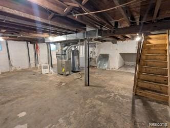 61 W End Ave, Waterford, MI 48328 - unfinished basement with stairs, gas water heater, and heating unit