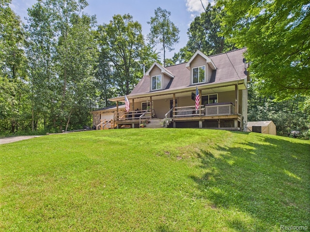 193 Miller Lake Rd, Columbiaville, MI 48421 - view of front of house featuring covered porch and a front lawn
