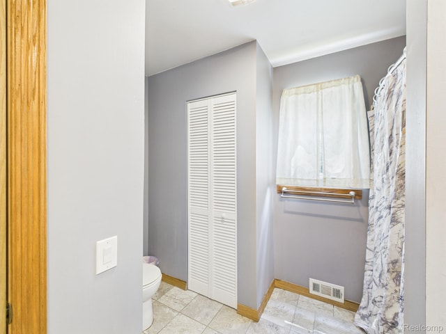 193 Miller Lake Rd, Columbiaville, MI 48421 - full bathroom featuring a closet and tile patterned floors