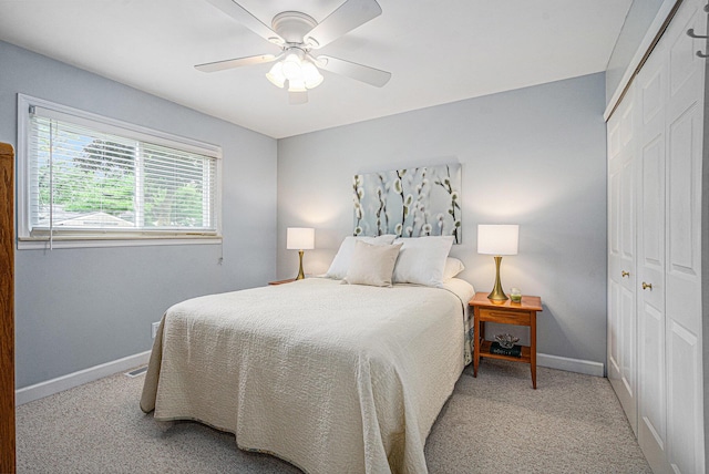 256 Nichols Dr, Saline, MI 48176 - carpeted bedroom with a closet and a ceiling fan