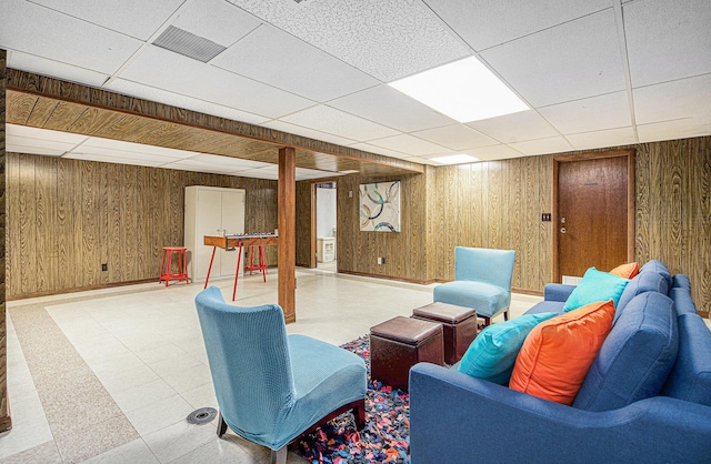 256 Nichols Dr, Saline, MI 48176 - living room with a paneled ceiling and wooden walls