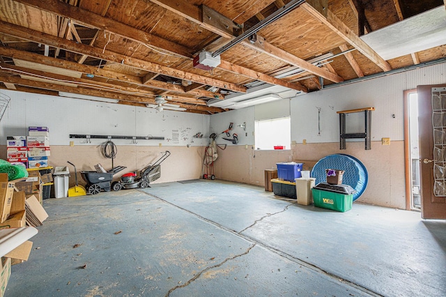 256 Nichols Dr, Saline, MI 48176 - garage featuring a garage door opener