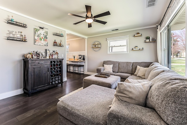 405 Spring St, Saline, MI 48176 - living area with a ceiling fan, ornamental molding, and dark wood-type flooring
