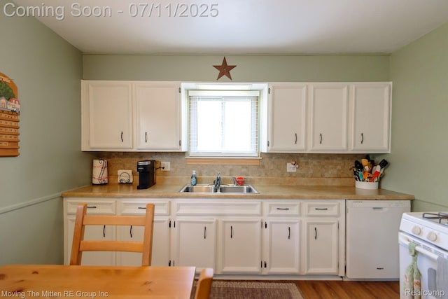 13620 Aston St, Romulus, MI 48174 - kitchen with white appliances, white cabinets, decorative backsplash, light countertops, and light wood finished floors
