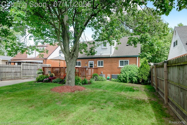 13620 Aston St, Romulus, MI 48174 - fenced backyard with a deck