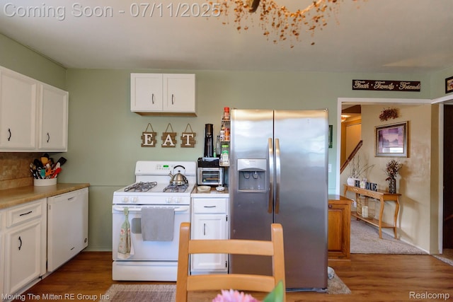 13620 Aston St, Romulus, MI 48174 - kitchen with white appliances, wood finished floors, white cabinets, and light countertops