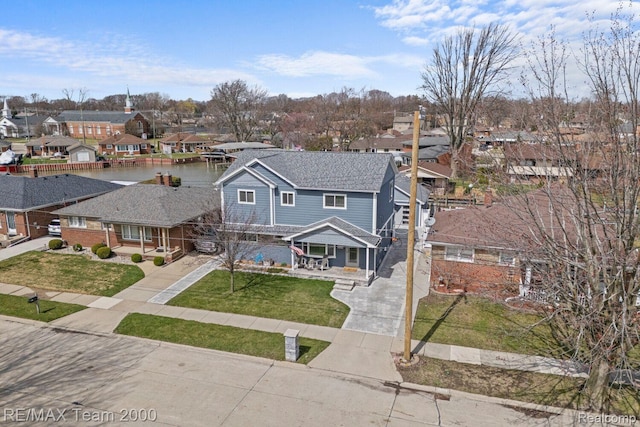 22543 E 11 Mile Rd, Saint Clair Shores, MI 48081 - aerial perspective of suburban area featuring a large body of water