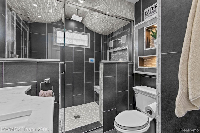 22543 E 11 Mile Rd, Saint Clair Shores, MI 48081 - bathroom featuring tile walls, a shower stall, and lofted ceiling