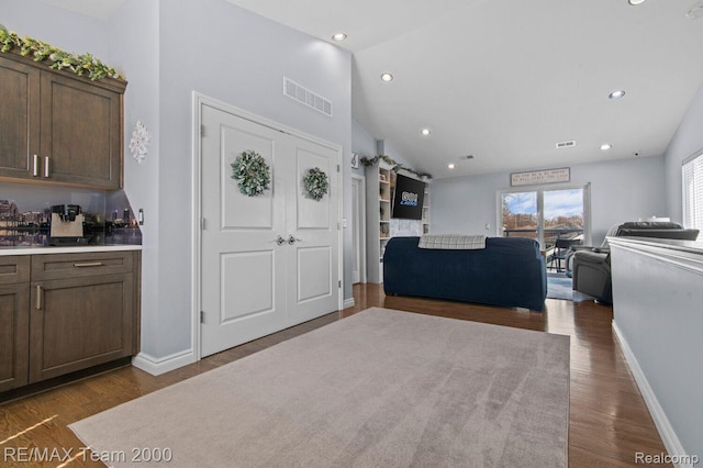 22543 E 11 Mile Rd, Saint Clair Shores, MI 48081 - entrance foyer featuring lofted ceiling, dark wood-style flooring, and recessed lighting