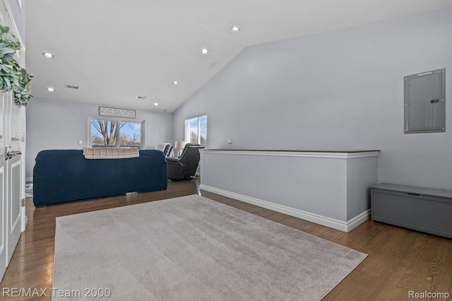 22543 E 11 Mile Rd, Saint Clair Shores, MI 48081 - sitting room featuring electric panel, wood finished floors, recessed lighting, and high vaulted ceiling