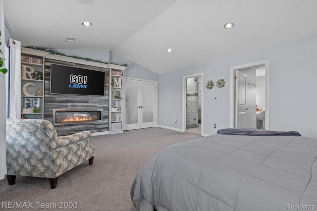 22543 E 11 Mile Rd, Saint Clair Shores, MI 48081 - carpeted bedroom with lofted ceiling, recessed lighting, a large fireplace, connected bathroom, and french doors