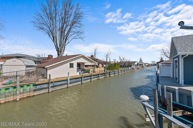 22543 E 11 Mile Rd, Saint Clair Shores, MI 48081 - dock area with a water view and a residential view