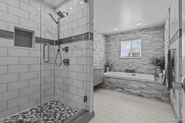 22543 E 11 Mile Rd, Saint Clair Shores, MI 48081 - bathroom with a garden tub, a stall shower, recessed lighting, and tile patterned flooring