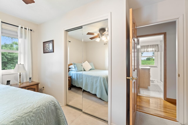2230 Oleary Rd, Jackson, MI 49201 - bedroom with a closet, multiple windows, and ceiling fan